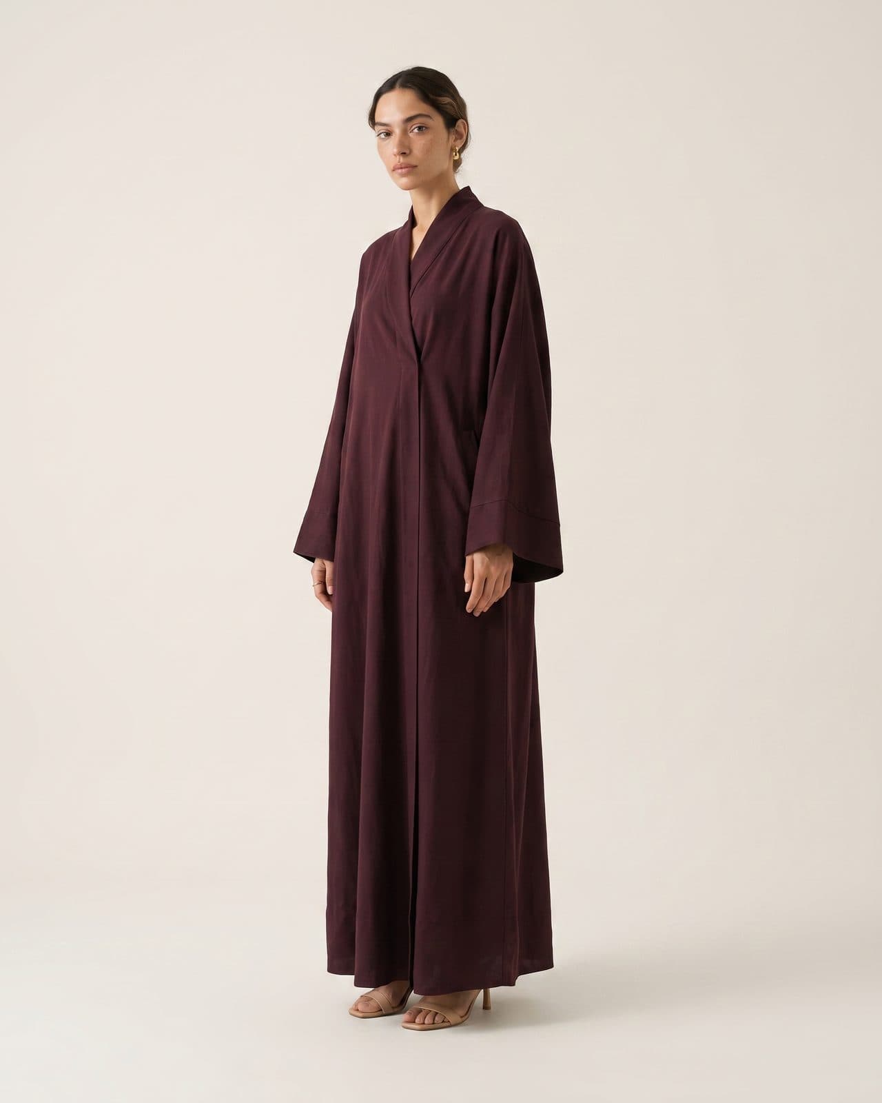 An oxblood crêpe evening abaya
